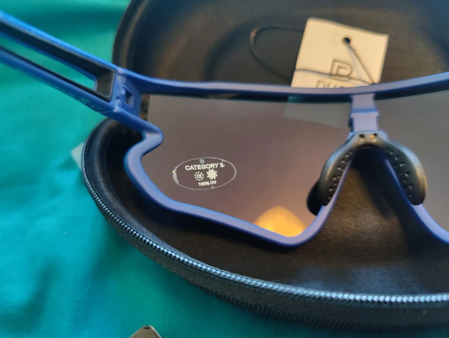 DUCO DC0023 Fahrradbrille weiß-schwarz Revo blau polarisiert