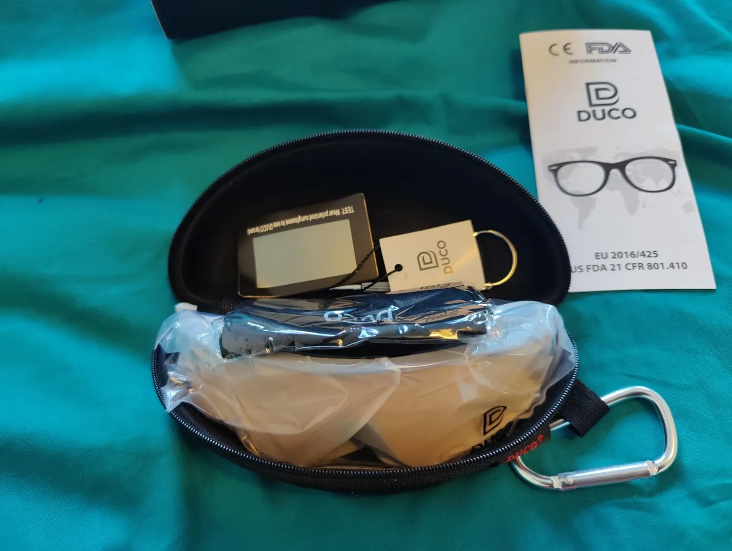 DUCO DC0023 Fahrradbrille weiß-schwarz Revo blau polarisiert