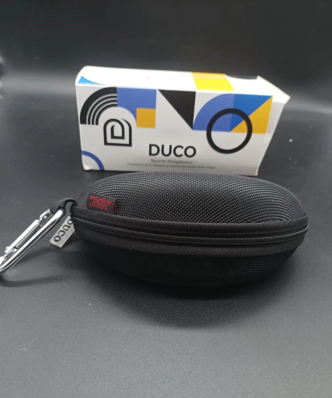 DUCO DC0023 Fahrradbrille weiß-schwarz Revo blau polarisiert