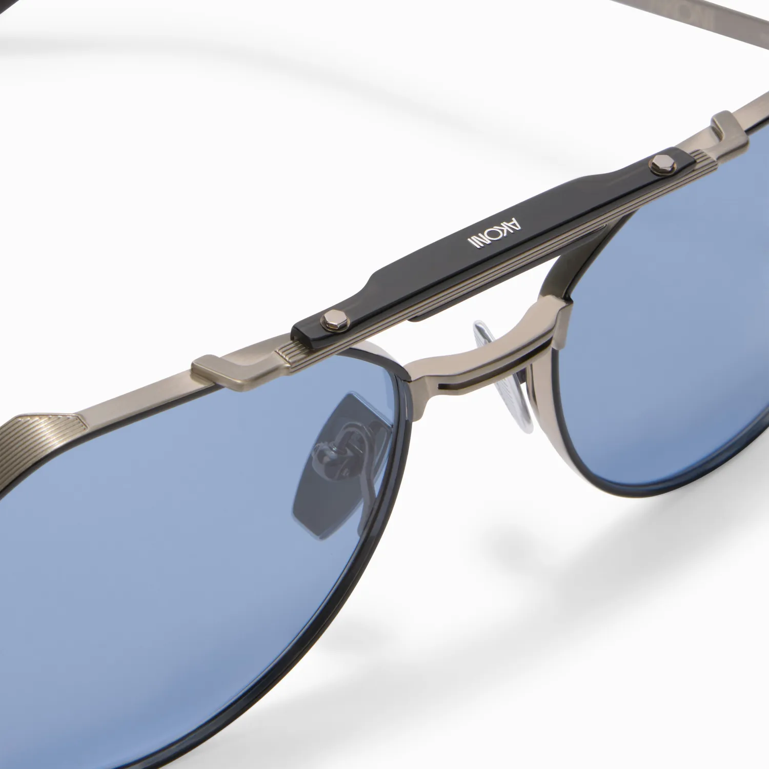 Akoni Astrolis Sonnenbrille Antiqued Silver Titan