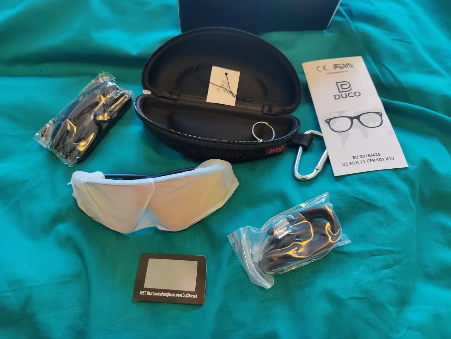 DUCO DC0023 Fahrradbrille weiß-schwarz Revo blau polarisiert