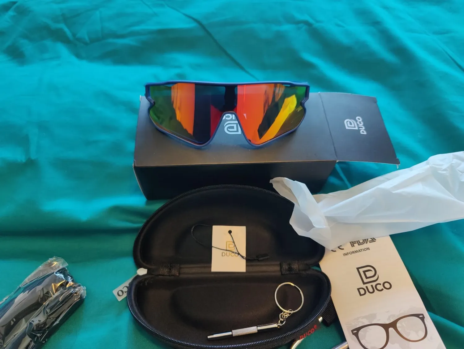 DUCO DC0023 Fahrradbrille weiß-schwarz Revo blau polarisiert