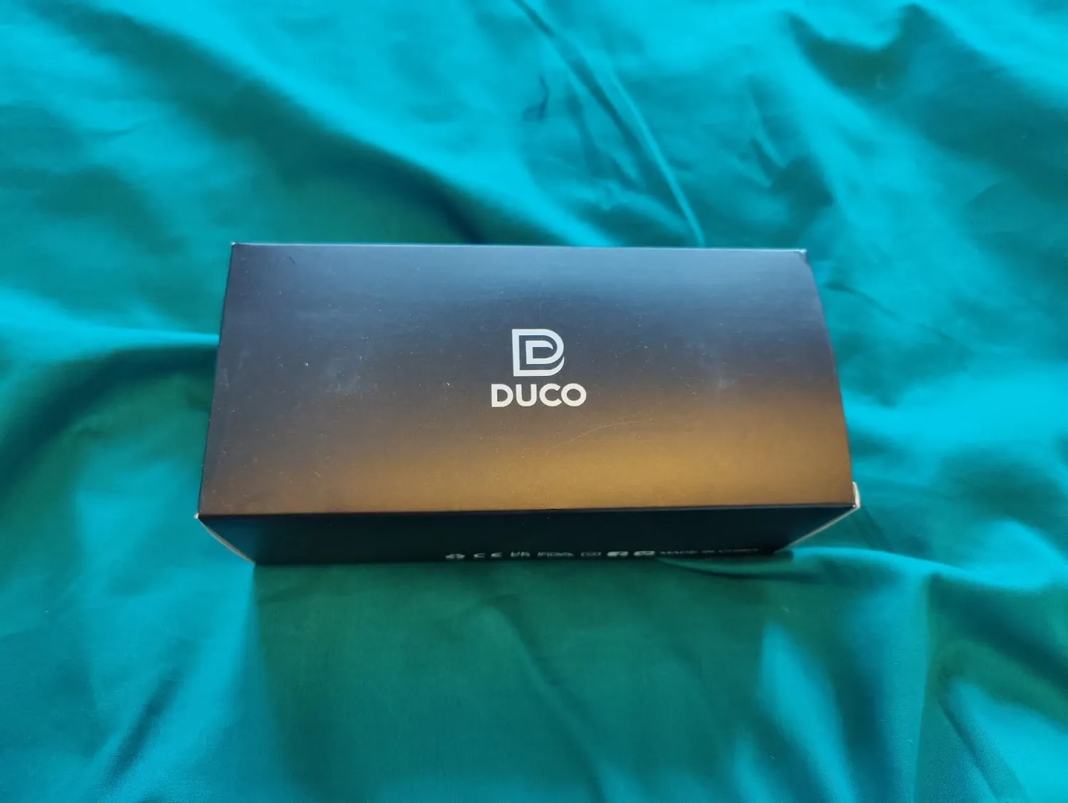 DUCO DC0023 Fahrradbrille weiß-schwarz Revo blau polarisiert