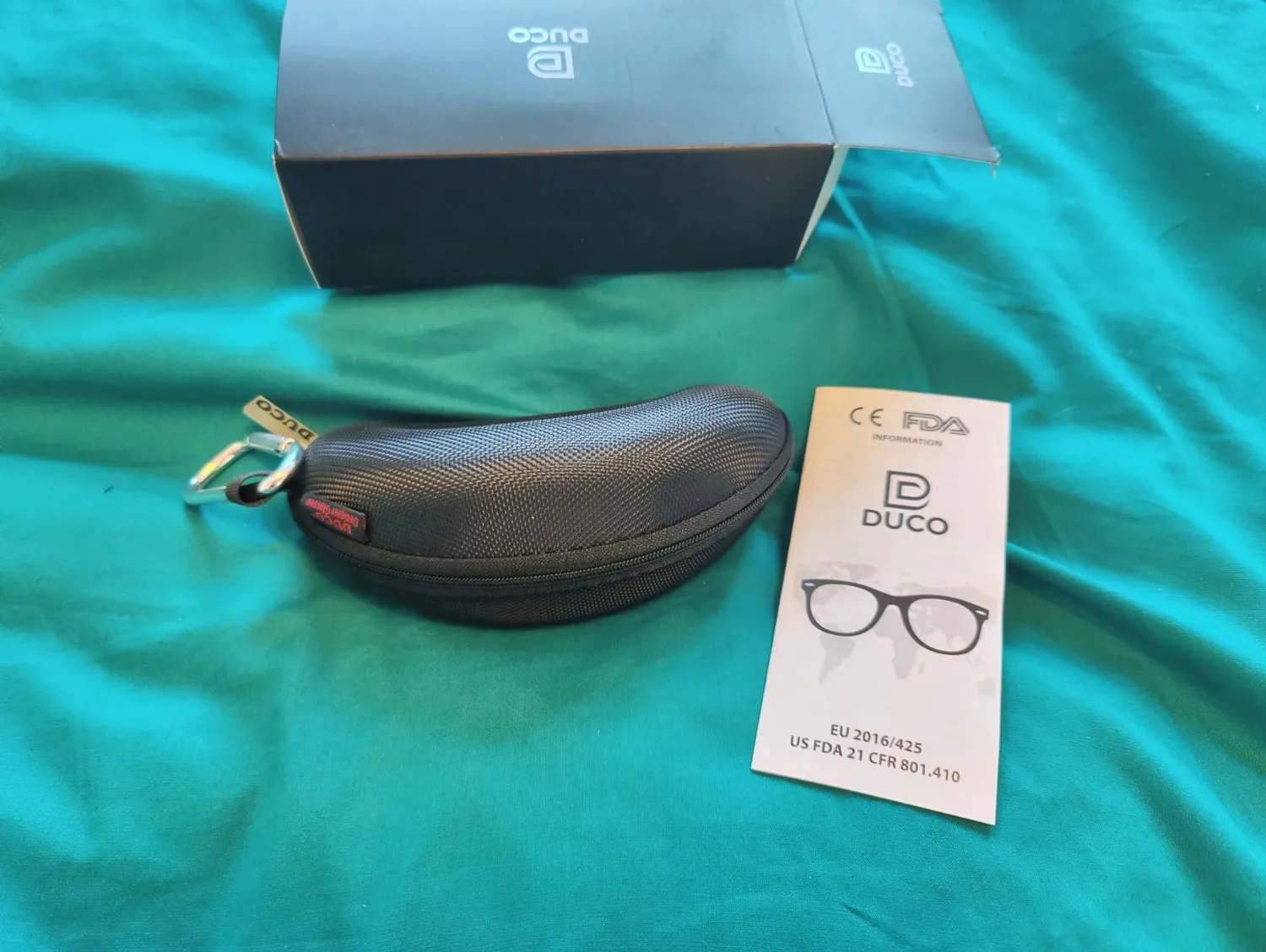 DUCO DC0023 Fahrradbrille weiß-schwarz Revo blau polarisiert